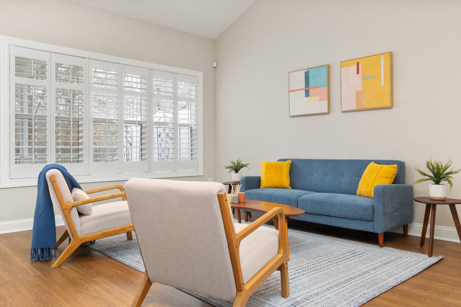 Calm living room styled with soft neutral decor and thoughtful accents